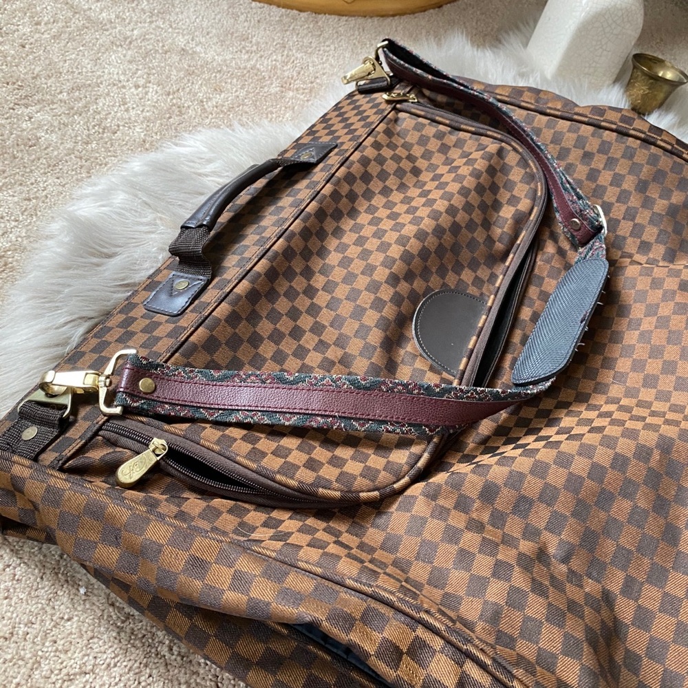 Brown checkered vintage garment bag for travel